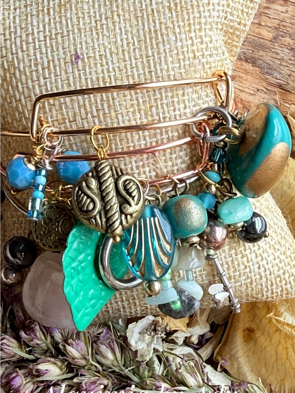 Amazonโs Turquoise and Gold Charm Bangle Bracelet Set stack